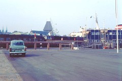 DSB MZ class with passenger train photographed at Aarhus habour 26. August 1974. The passenger train had connection to the ferry to Kalundborg via Samsø.  The MZ class (type I and II) was purchased from 1967 to 1970 in a number of 26. Only a few of these engines remain in service by DSB - most are now sold to other companies. Built by NOHAB and Frichs. Dieselelectric. Co'Co'. 2270 kW - 3300 hp. Max speed 143 km/h - 89 mph. Length 20 800 mm. Weight 116,5 metric tonnes.